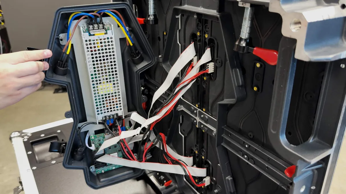 Inside a Mirackle LED cabinet: power supply, receiving card, hub board and ribbon cabling